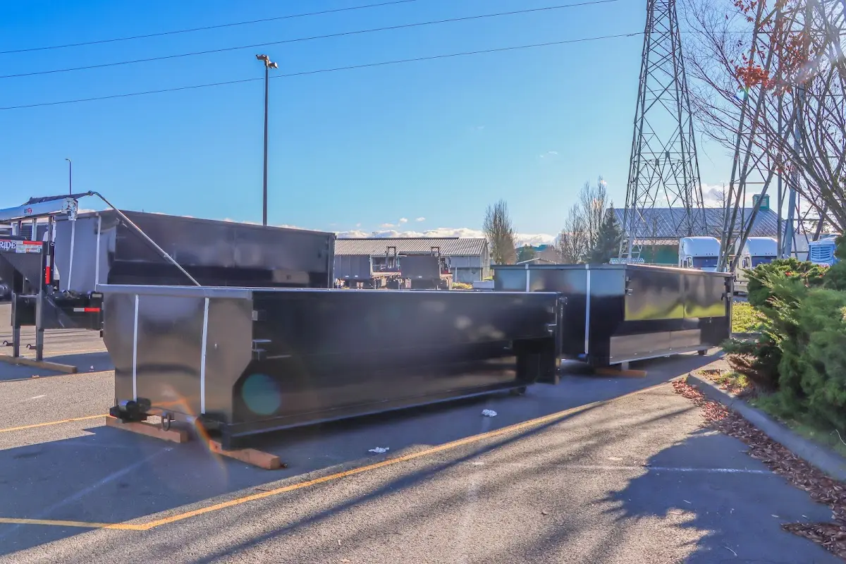 Roll-off dumpster ready for waste disposal at job site for 3 Yard Dumpster Rental in Atlantic